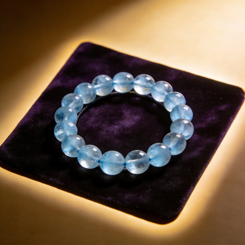 Aquamarine Men's 12mm natural stone bracelet on dark velvet