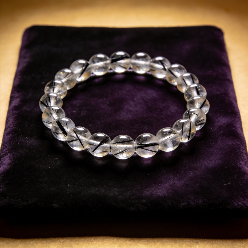 Black Rutilated Quartz Women's 8mm natural stone bracelet on dark velvet