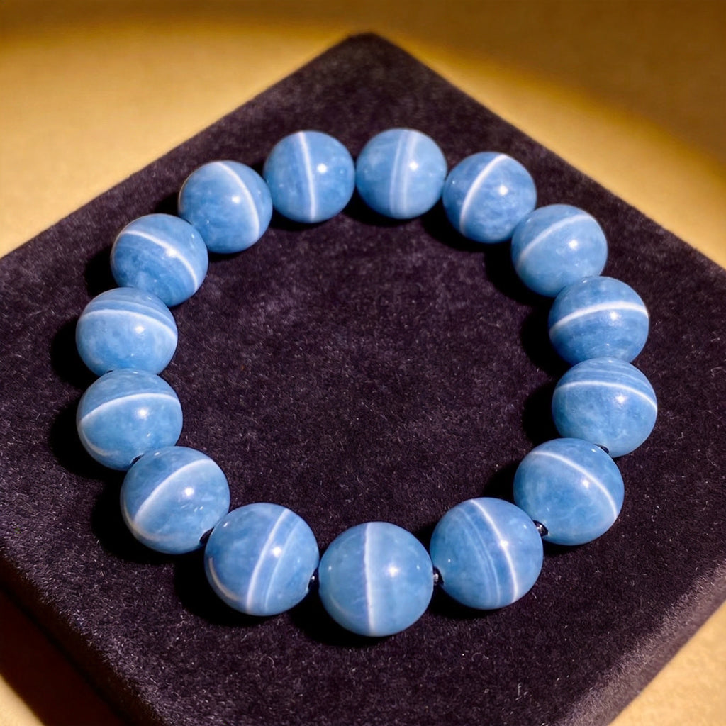 Blue Lace Agate Men's 12mm natural stone bracelet on dark velvet