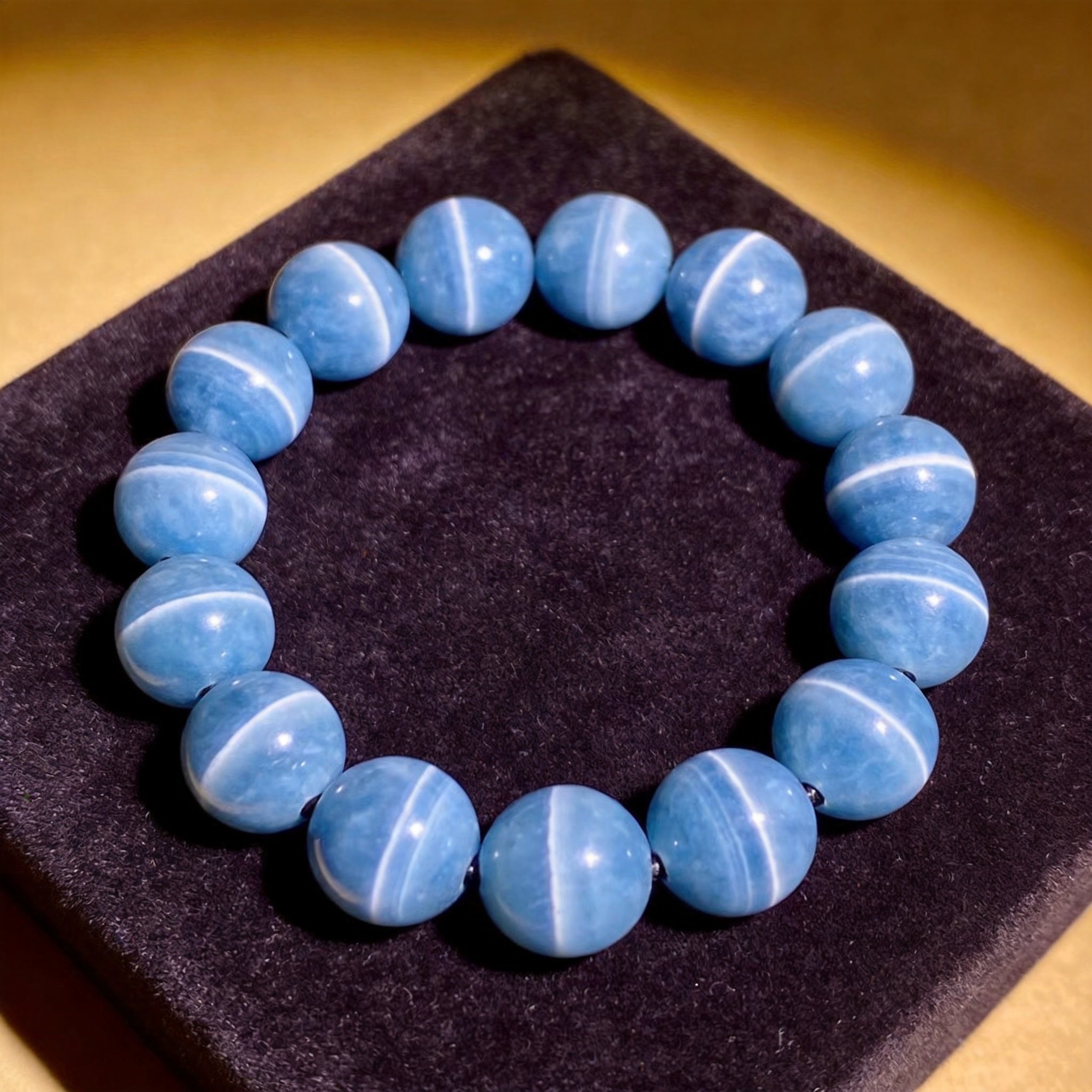 Blue Lace Agate Men's 12mm natural stone bracelet on dark velvet