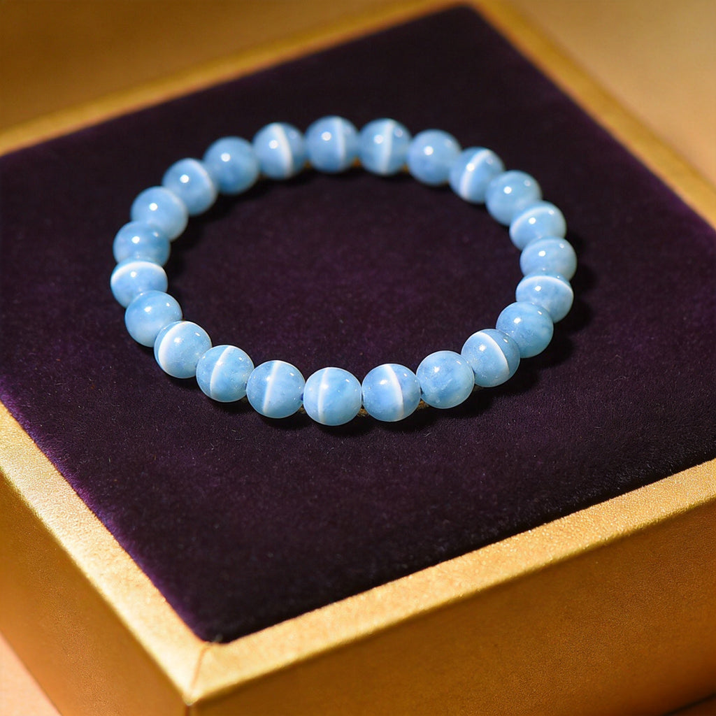 Blue Lace Agate Women's 8mm natural stone bracelet on dark velvet