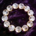 Clear Quartz Women's 8mm natural stone bracelet on dark velvet