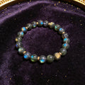 Labradorite Women's 8mm natural stone bracelet on dark velvet