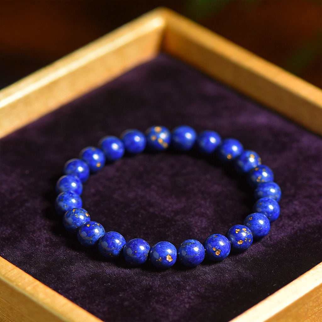 Lapis Lazuli Women's 8mm natural stone bracelet on dark velvet