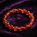 Red Agate Women's 8mm natural stone bracelet on dark velvet