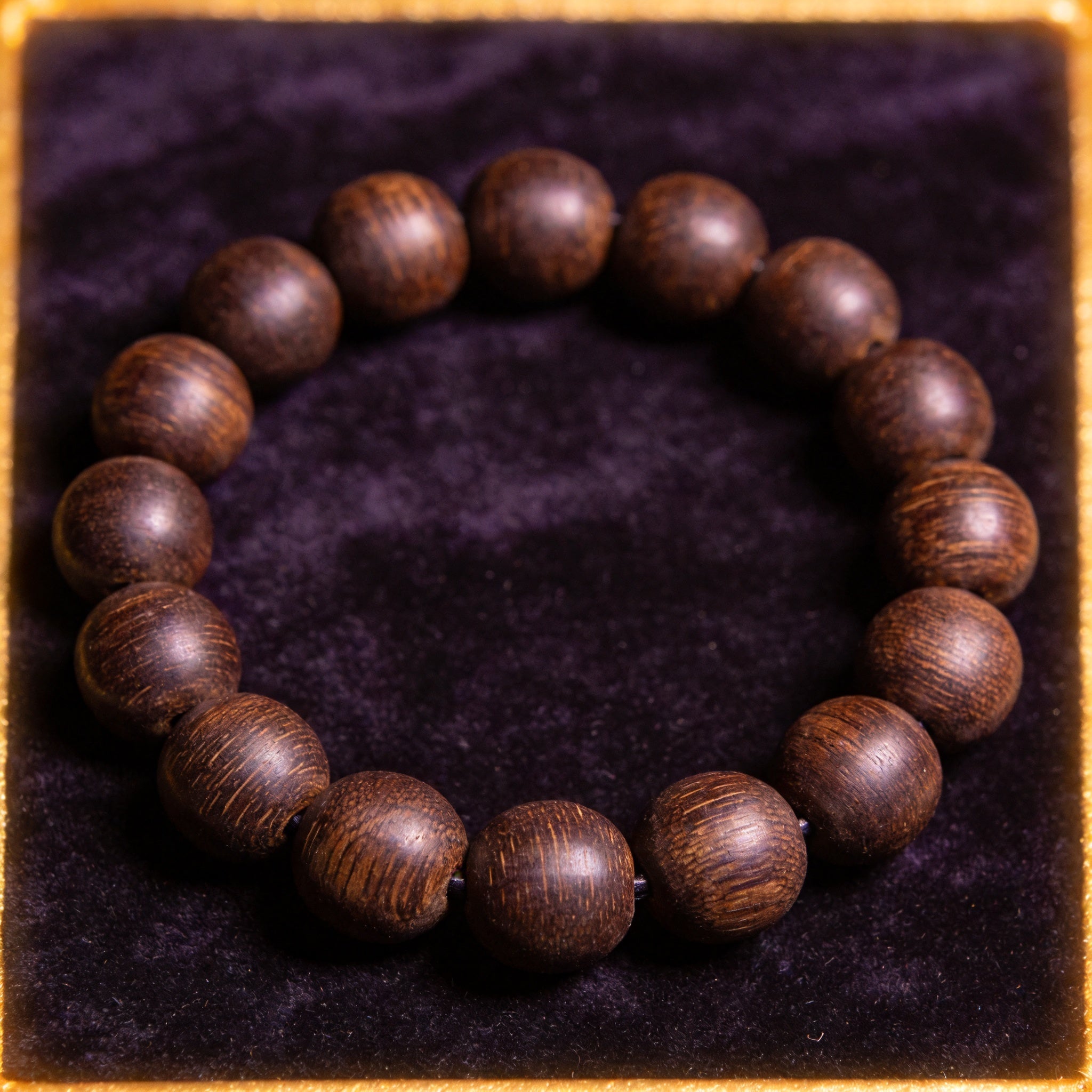 Wood Stone Men's 12mm natural stone bracelet on dark velvet