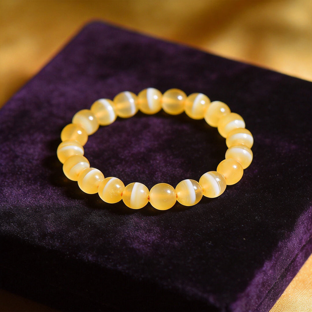 Yellow Agate Women's 8mm natural stone bracelet on dark velvet